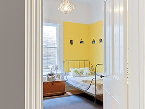 Yellow feature bedroom wall project